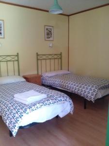 Postel nebo postele na pokoji v ubytování Camping Cobijo