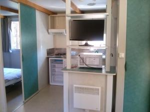 Kuchyň nebo kuchyňský kout v ubytování Camping Cobijo