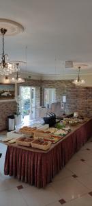 a buffet line with many different types of food at Baron in Sztutowo