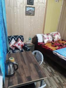 Postel nebo postele na pokoji v ubytování Smriya Homestay