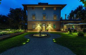 Aed väljaspool majutusasutust Villa Campomaggio Resort & SPA