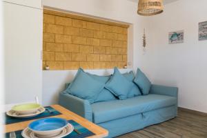 A seating area at Albarìa Favignana Apartments