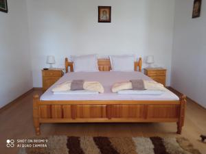 Postel nebo postele na pokoji v ubytování Дядо Цоньовата къща