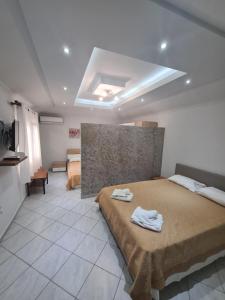 Posteľ alebo postele v izbe v ubytovaní Villa Valeria Thassos