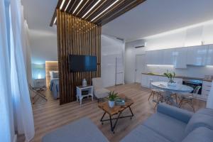 TV a/nebo společenská místnost v ubytování 1571_SUITES A1