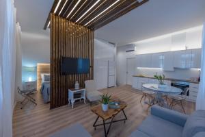 TV a/nebo společenská místnost v ubytování 1571_SUITES A1