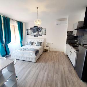 A bed or beds in a room at Villa Volta 3 Policlinico Monserrato