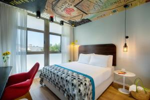 Voodi või voodid majutusasutuse Hotel 75 by Prima Hotels toas +37 fotot