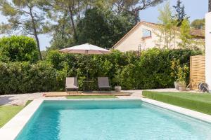Swimmingpoolen hos eller tæt på Luxurious and spacious apartment in the heart of the Côte d'Azur