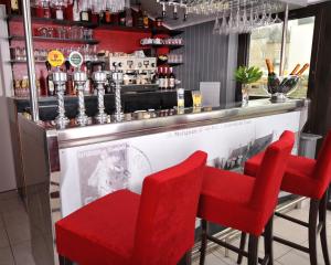 The lounge or bar area at Contact Hôtel de Matignon