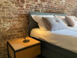 Een bed of bedden in een kamer bij De Hoendervorst