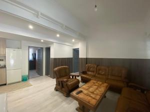 Posezení v ubytování Holiday Apartmanház