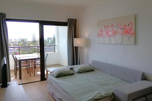 Giường trong phòng chung tại Iguazu TIR24 Top Floor Apartment +34 ảnh