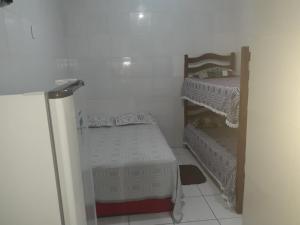 a small room with two bunk beds in it at Pousada São Paulo Piranhas AL in Piranhas