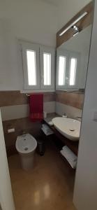 A bathroom at Appartamento Palazzo Ancona