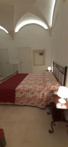 A bed or beds in a room at Appartamento Palazzo Ancona