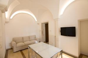 A television and/or entertainment centre at Appartamento Palazzo Ancona