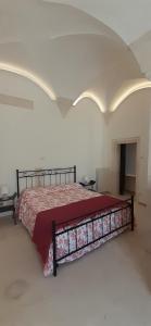 A bed or beds in a room at Appartamento Palazzo Ancona