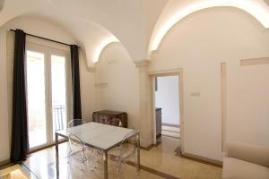 A seating area at Appartamento Palazzo Ancona