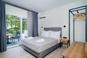 Postel nebo postele na pokoji v ubytování Solar Suites