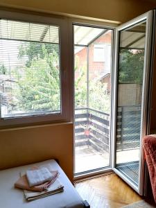 Postel nebo postele na pokoji v ubytování Dora Apartment
