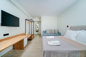 Postel nebo postele na pokoji v ubytování Solar Suites