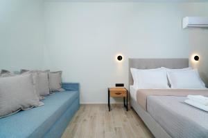 Postel nebo postele na pokoji v ubytování Solar Suites