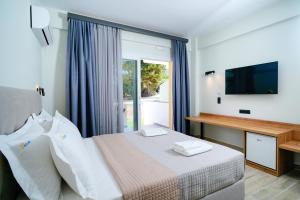Postel nebo postele na pokoji v ubytování Solar Suites