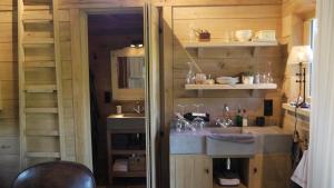 Kuchyň nebo kuchyňský kout v ubytování B&B Hemel & Haard