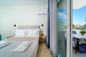 Postel nebo postele na pokoji v ubytování Solar Suites