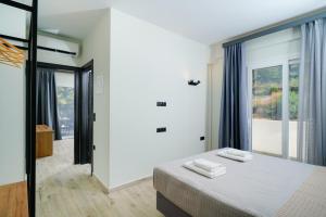 Postel nebo postele na pokoji v ubytování Solar Suites