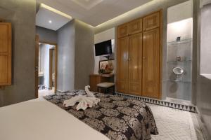 Voodi või voodid majutusasutuse Riad L'Etoile D'Orient toas