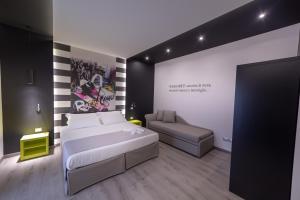 A bed or beds in a room at HOLYGOLD Suite ****