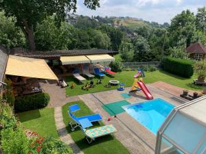 an aerial view of a backyard with a pool at Pino24 in Hallenberg