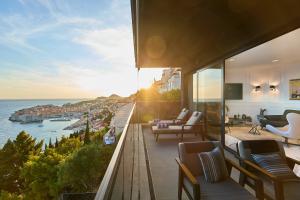 a balcony with a view of the ocean at New & Luxury 5* with Breathtaking View- Kiki Lu Apartment in Dubrovnik