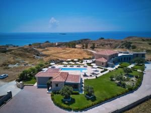 an aerial view of a house with a swimming pool at Tramonto Suites in Xi