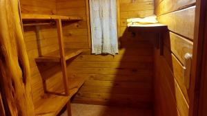 Palanda nebo palandy na pokoji v ubytování Calen-Hue