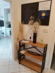 Una televisión o centro de entretenimiento en Ferienwohnung mit 2 Schlafzimmer oder Studio Apartment - Istrien-Fiorini