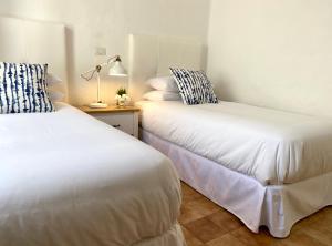 Postel nebo postele na pokoji v ubytování Apartamento Casa Cristina