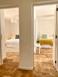 Postel nebo postele na pokoji v ubytování Apartamento Casa Cristina
