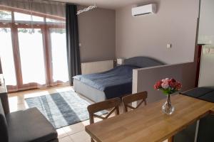 Posteľ alebo postele v izbe v ubytovaní Vénusz Stúdió Apartman