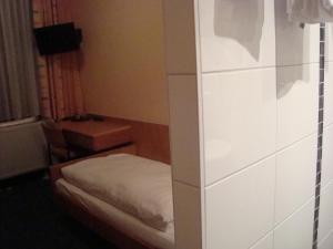 Postel nebo postele na pokoji v ubytování Hotel Gartenhof