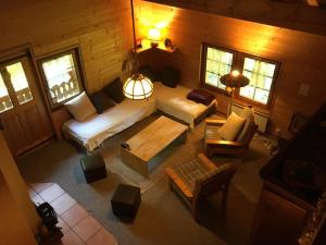 Postel nebo postele na pokoji v ubytování Appartement - dans le chalet Carmazin