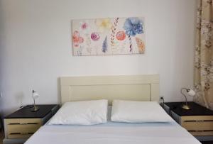 Postel nebo postele na pokoji v ubytování Apartman Kampor