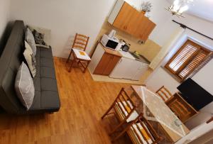 Kuchyň nebo kuchyňský kout v ubytování Apartman Kampor