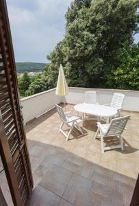 Balkón nebo terasa v ubytování Apartman Kampor