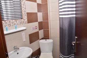 Koupelna v ubytování Hotel Paris
