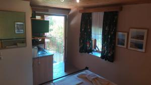 Kuchyň nebo kuchyňský kout v ubytování Aiolis Rooms