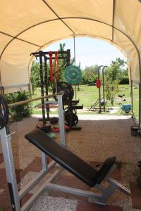 The fitness centre and/or fitness facilities at Tuscan Dream Casa Vacanze