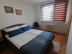 Katil atau katil-katil dalam bilik di Apartman Alina - free public parking